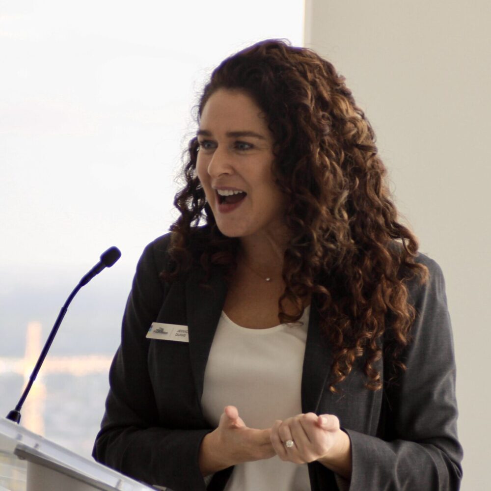 Woman at microphone | The Miami Foundation